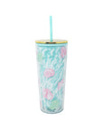 Tumbler with floral design and straw on a white background