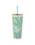 Tumbler with floral design and straw on a white background