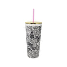 A tall insulated tumbler with a black and white zebra and jungle print, featuring a gold metal lid and a pink straw, set against a plain white background.