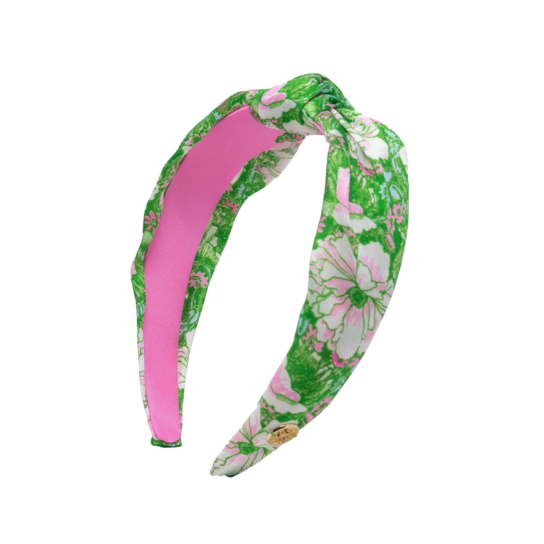 Floral headband with pink center on a white background