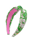 Floral headband with pink center on a white background