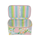 Colorful striped interior of floral patterned makeup bag with pink accents on a white background