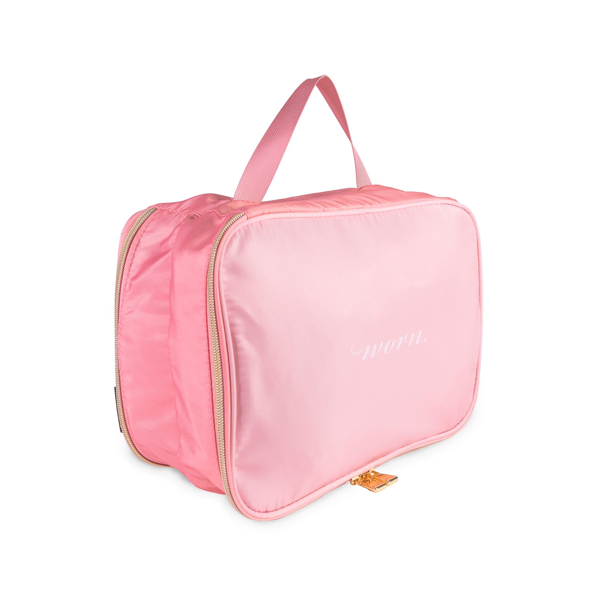 Pink travel bag with a handle on a white background