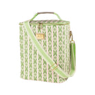 A square-shaped cooler bag with a green and pink geometric pattern, featuring a top handle, a detachable shoulder strap, and a gold-tone brand plaque on a white background.