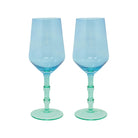 Two blue wine glasses with green stems on a white background