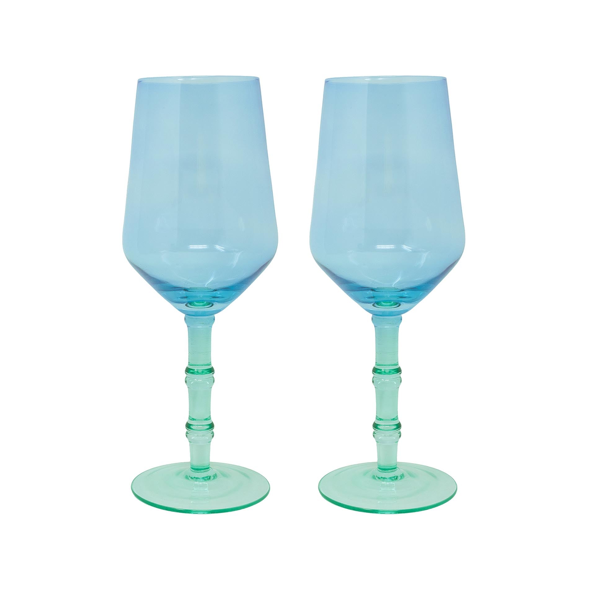 Two blue wine glasses with green stems on a white background