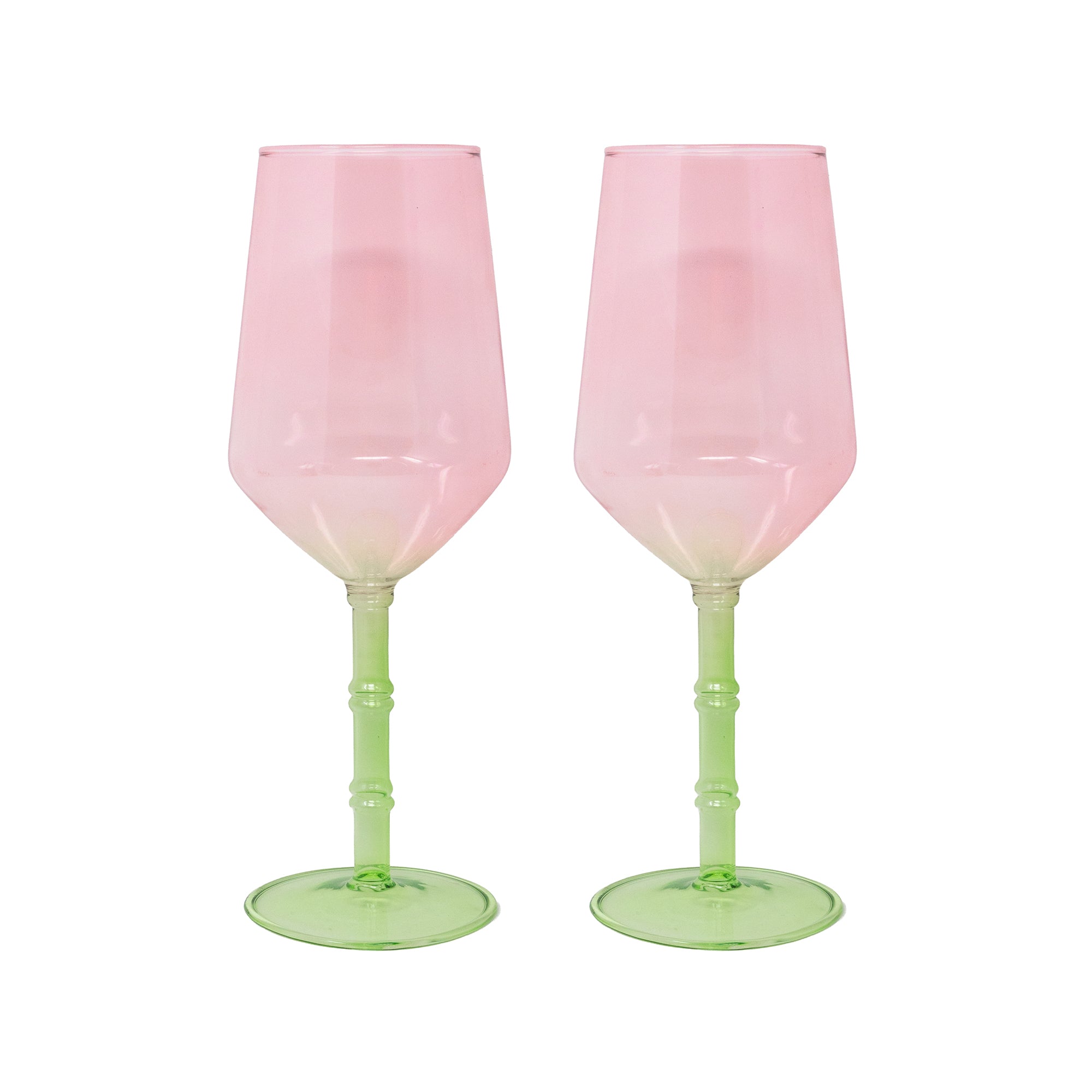 Two pink and green translucent wine glasses with a bulbous bowl and ribbed stems, shown side by side on a white background.