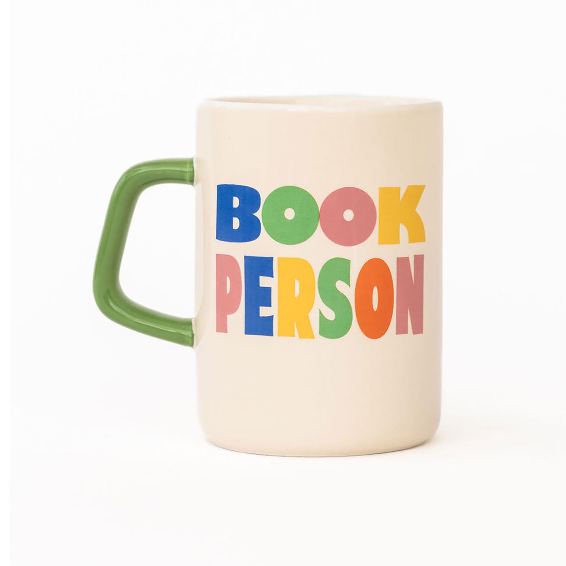Mug with 'BOOK PERSON' text in colorful letters on a white background