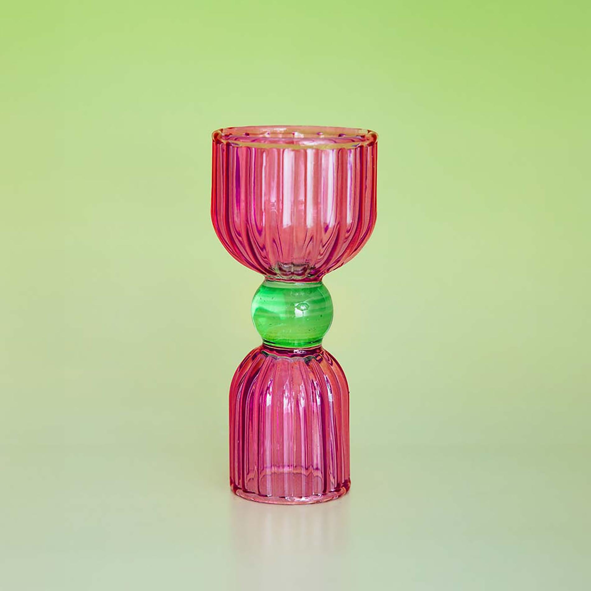 Pink shot glass with green circle center