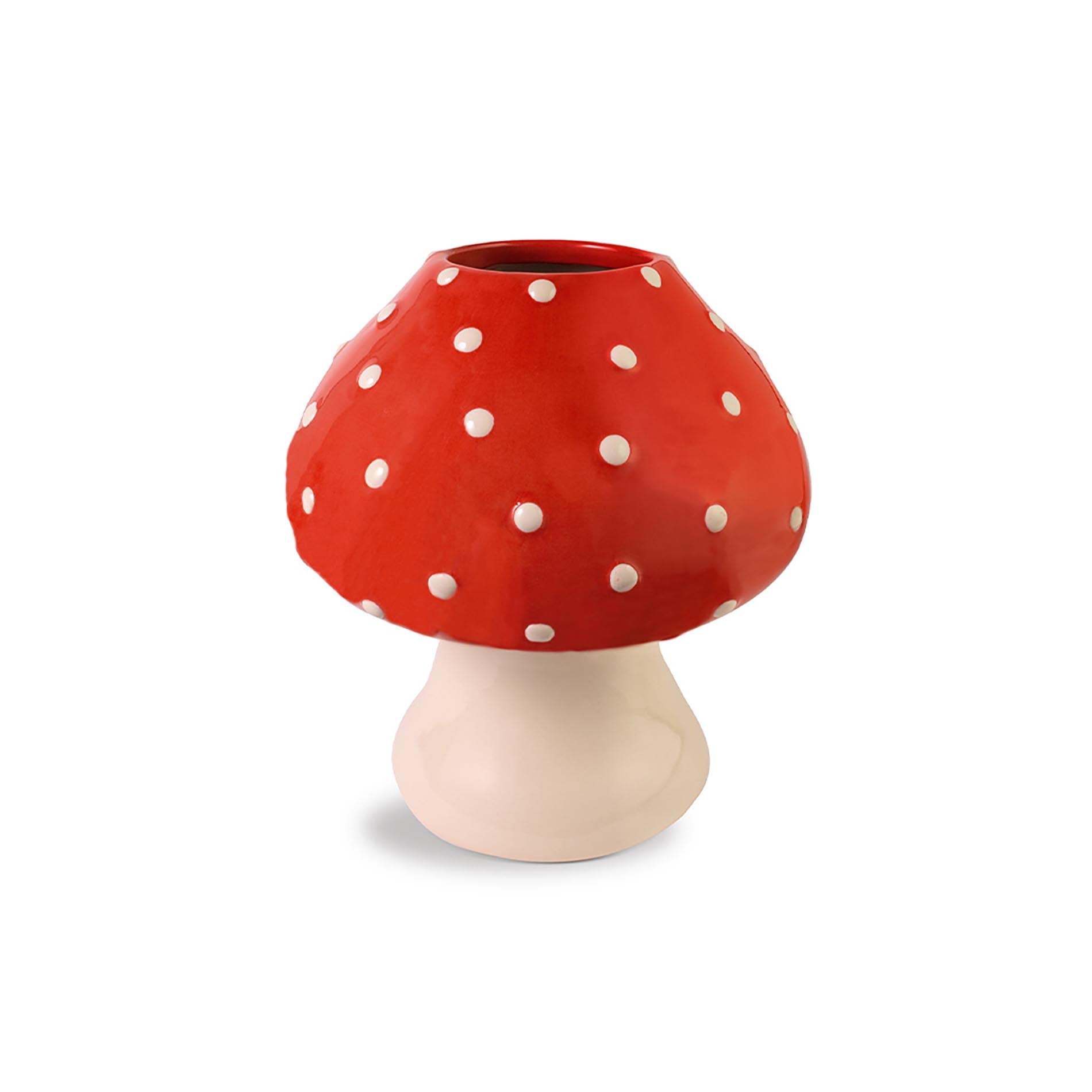 Mushroom-shaped vase with red cap and white polka dots on a beige stem against a white background