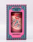 Packaged lucky cherry cream soda with ornament  on a white background