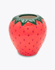 Ceramic strawberry-shaped container on a white background
