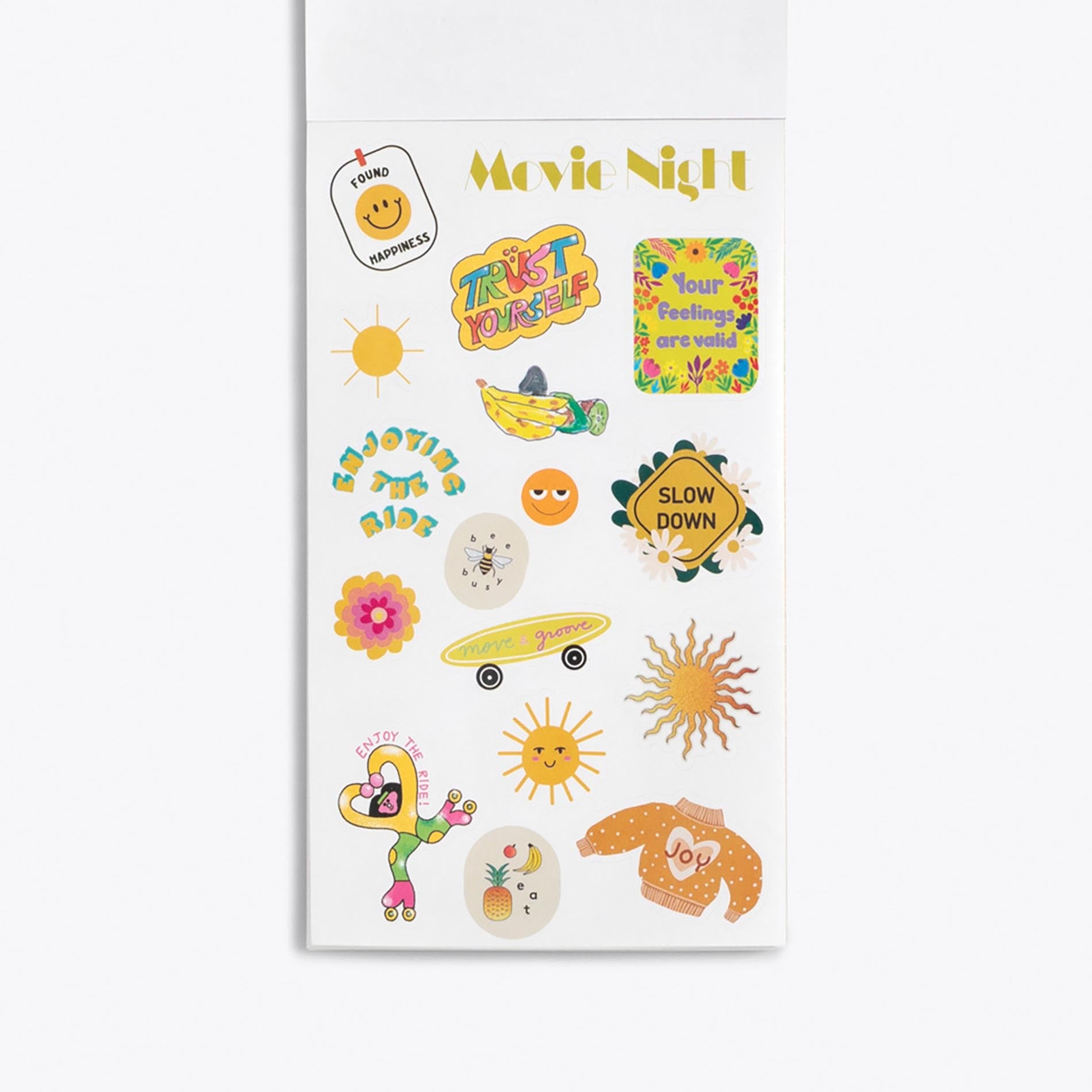 Sheet of colorful stickers with various designs on a white background