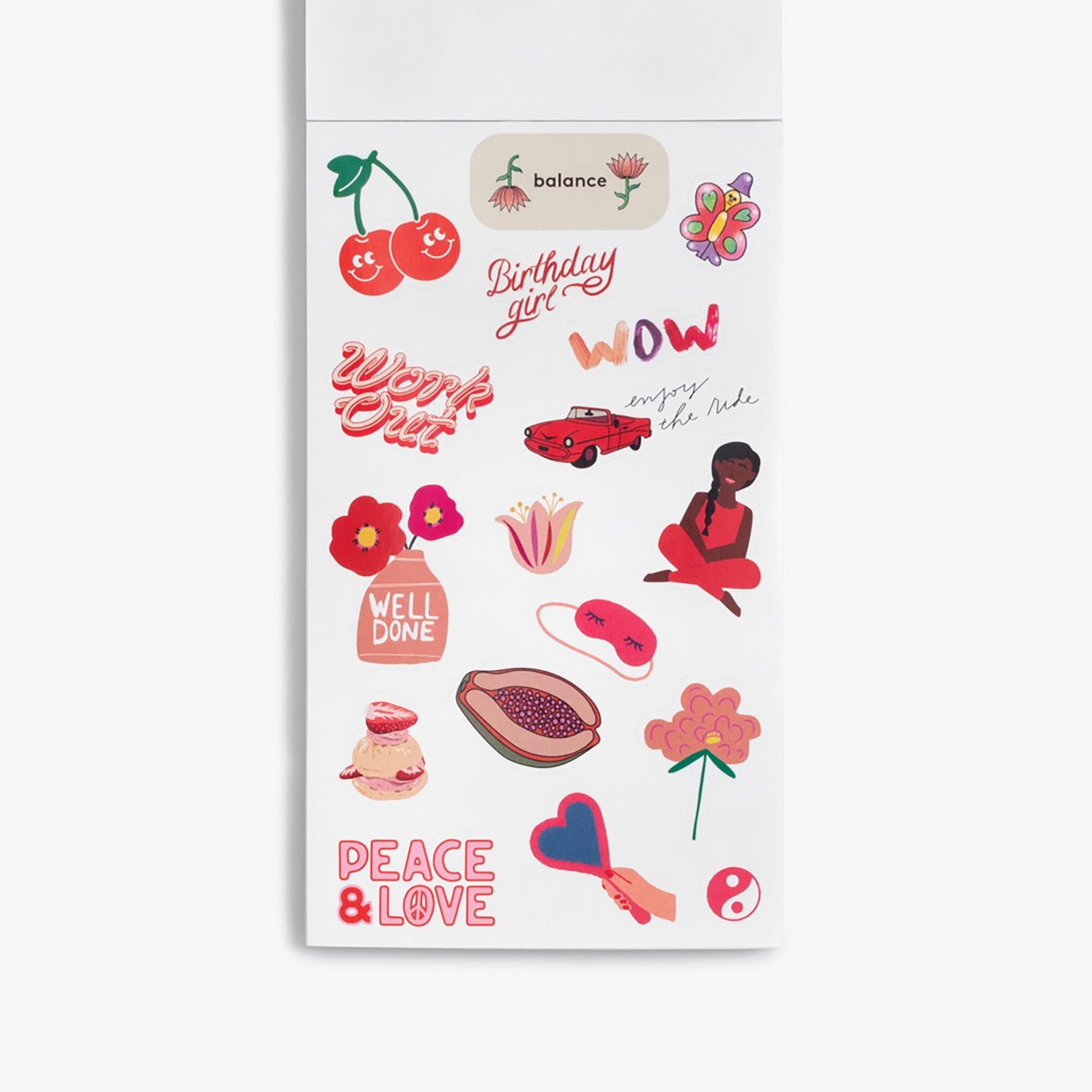 Sheet of stickers with various designs including text and illustrations on a white background