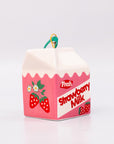 Strawberry milk carton-shaped ornament on a white background
