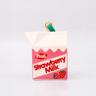 Strawberry milk carton-shaped ornament on a white background