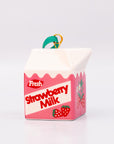 Strawberry milk carton-shaped ornament on a white background