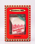 Packaged strawberry milk carton-shaped ornament on a white background