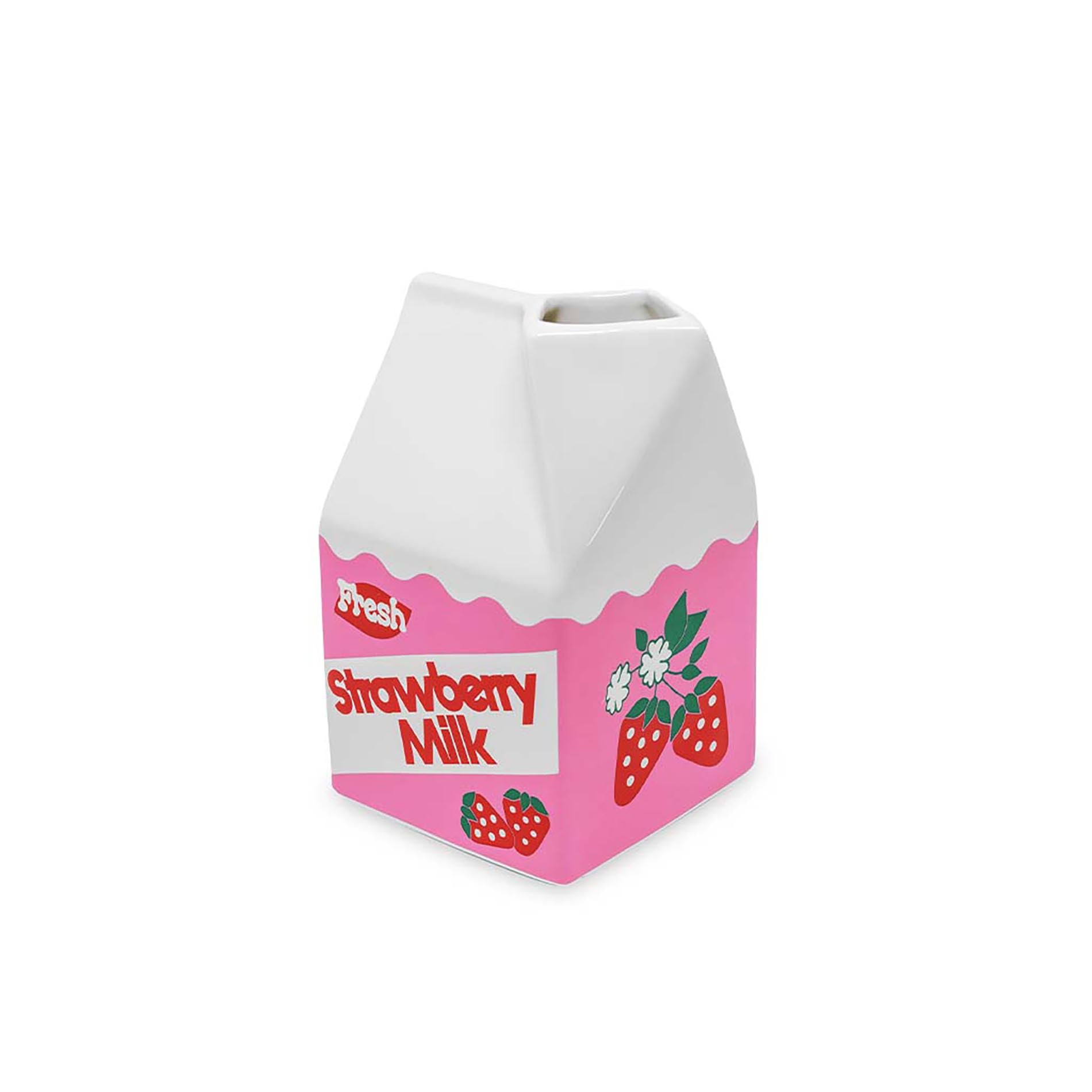 Pink and white strawberry milk carton-shaped vase on a white background