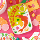Colorful sardine ceramic tray on a colorful background