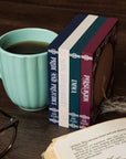 Floral-patterned coasters with jane austen book titles on the side