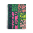 green mini notebook with colorful wicked text