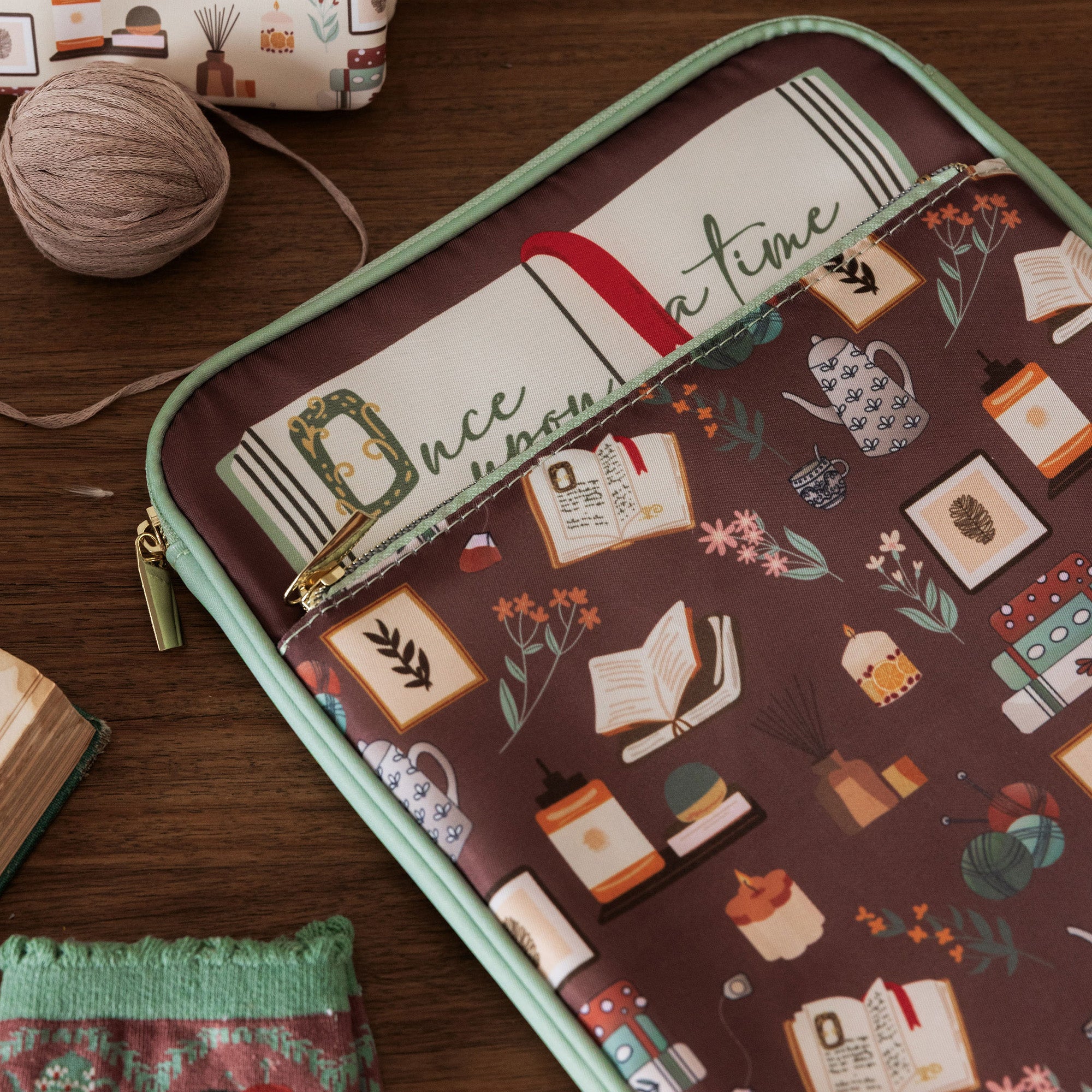brown book sleeve with colorful cozy book nook icons