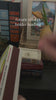 model showcasing stacked book candle