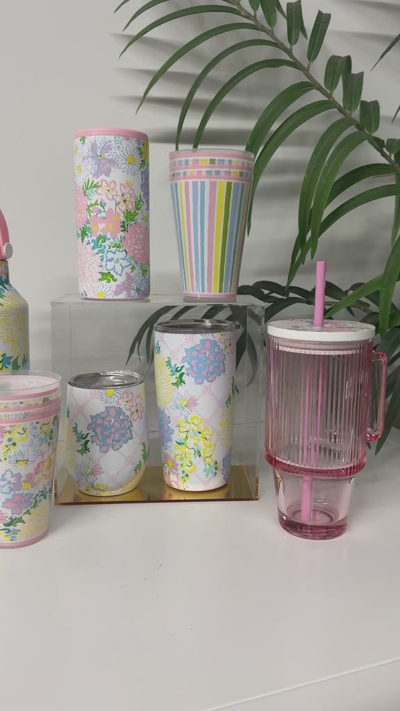 showcasing of several colorful floral and stripe cups and tumblers