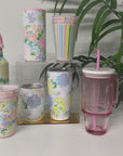 showcasing of several colorful floral and stripe cups and tumblers