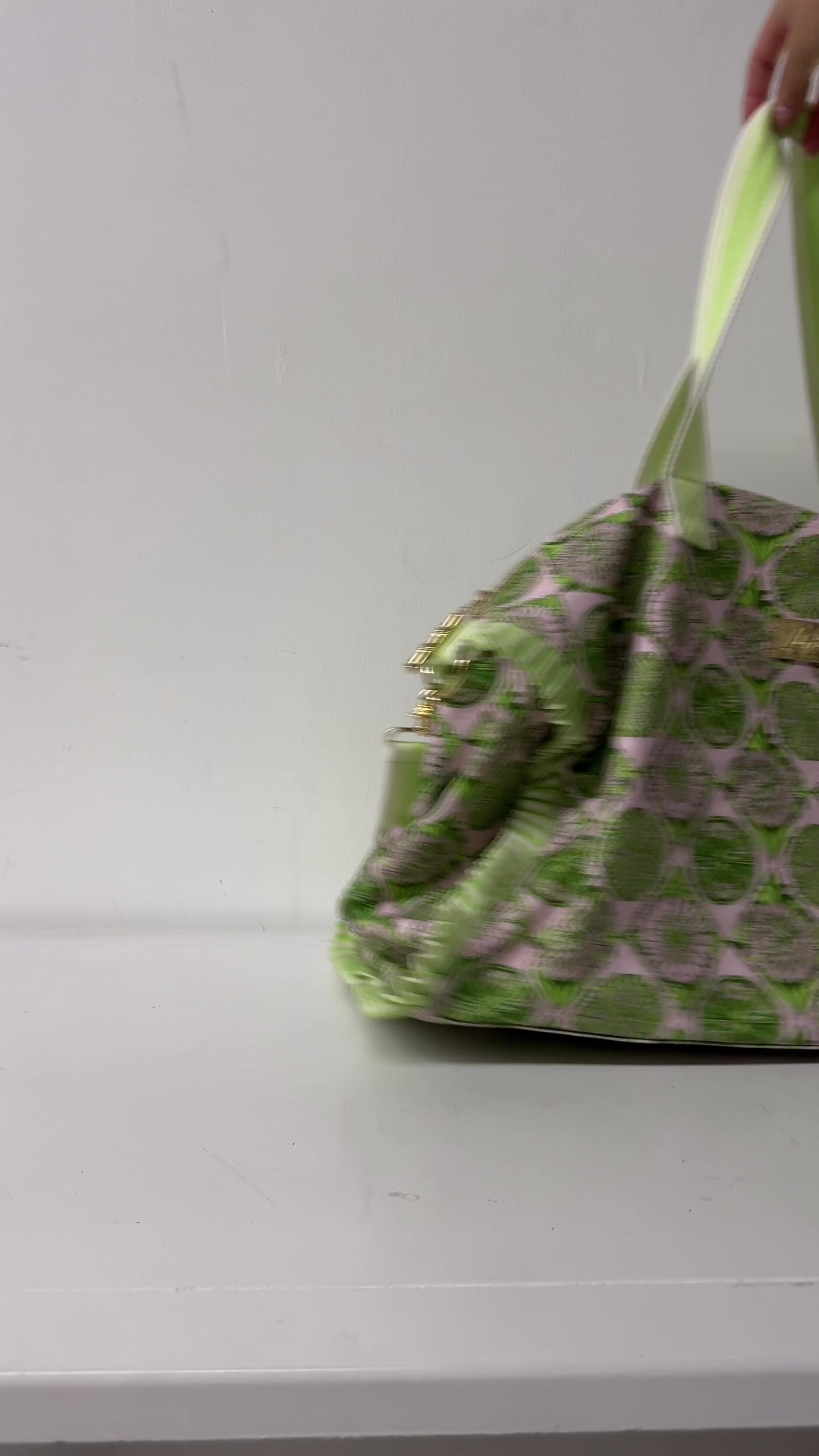 model showcasing duffle bags