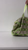 model showcasing duffle bags