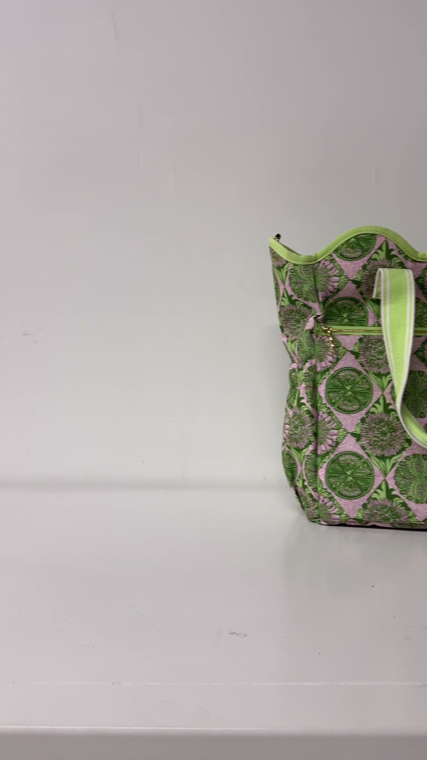 model showcasing pink and green scalloped cooler tote