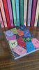model showcasing colorful astrology notebook