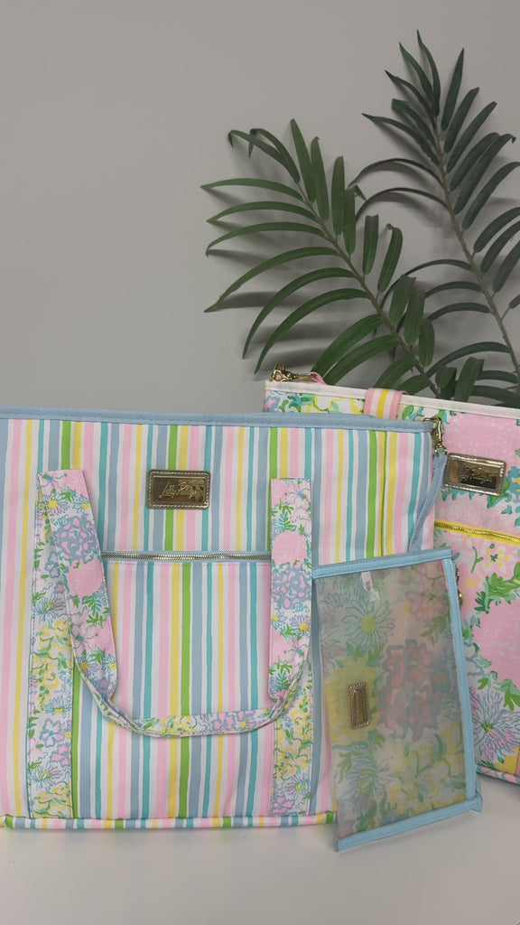 model showcasing colorful cooler totes