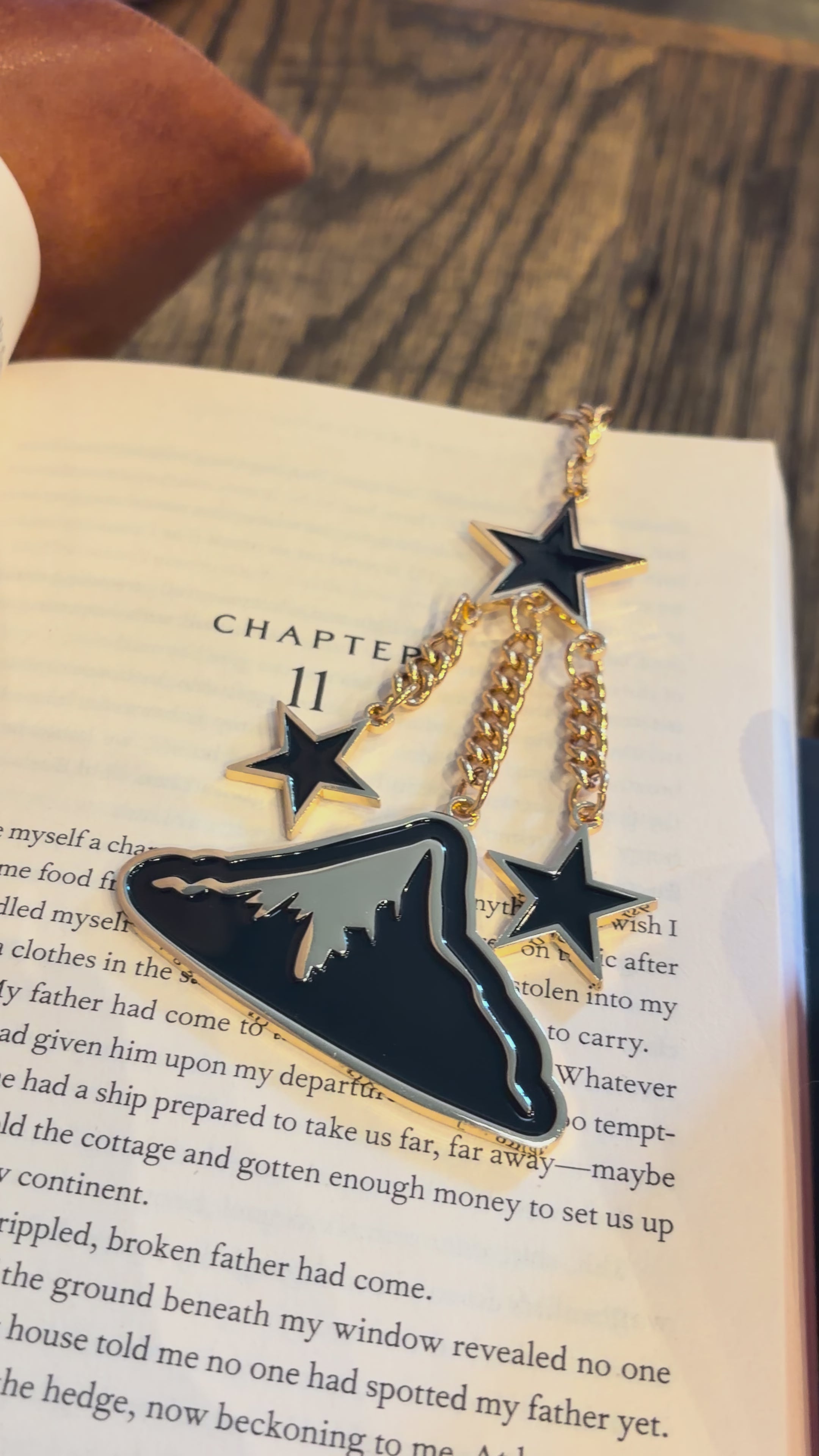 black mountain and star bag charm