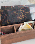 model using a label maker for tortoise shell file folders
