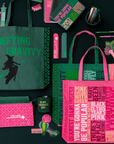 Collection of green and pink tote bags, mugs, and other items with text and graphics on a black background.