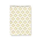 white top spiral notebook with gold floral design