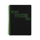 black mini notebook with green 'in my wicked era'